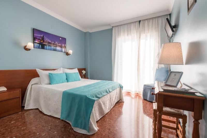 Romerito Málaga Cameră foto